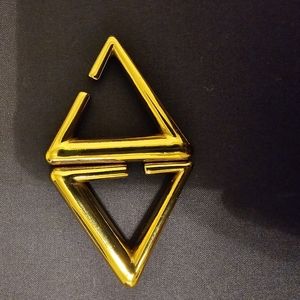 Gold weighted hangers for stretched ears.